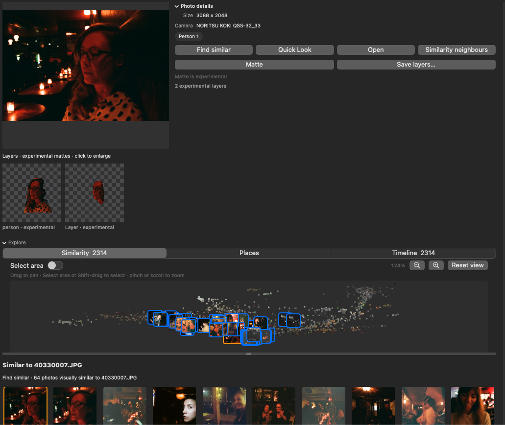 The Similarity map for a 2,314-photo library: a wide point cloud with a cluster of photo thumbnails outlined in blue, above select-area, zoom, and Reset view controls.